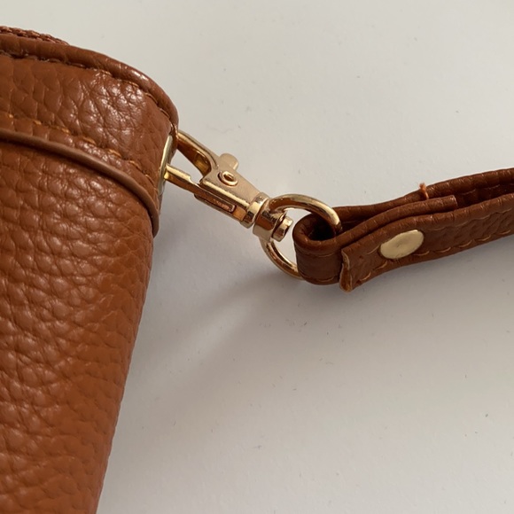 Under One Sky wristlet 8”x4”x1.5”. Caramel brown with floral embellishments. - Picture 4 of 6